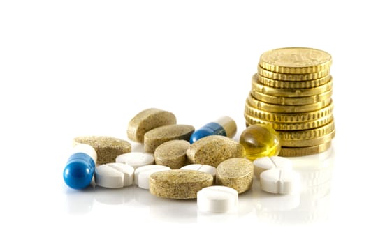 medicine and money isolated on white