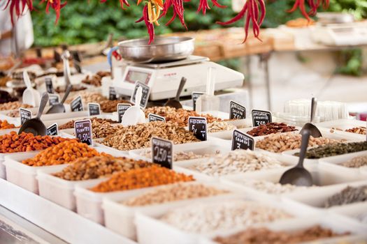 variation of different nuts on market outdoor in summer