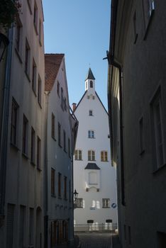 Narrow street - path in old town of Augsburg, Germany