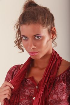 Young woman with scarf and trendy blouse