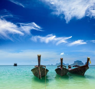 Long tail boats on tropical beach, Krabi, Thailand