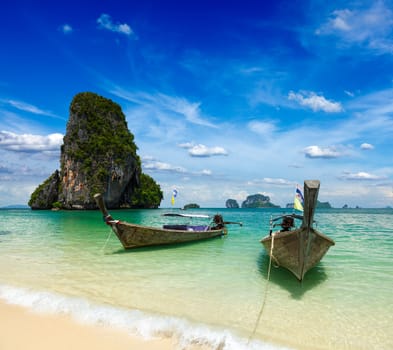 Long tail boats on tropical beach, Krabi, Thailand