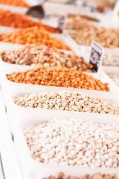 variation of different nuts on market outdoor in summer