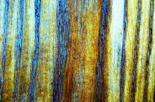 Background of blurred brown wood imitation furniture texture.