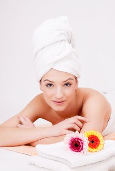 beautiful woman with towel relaxation massage wellness