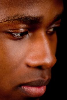 young african afro man with dark skin on black background