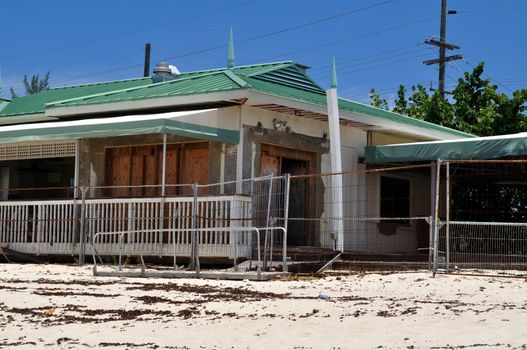 Old, abandoned beach house located on the Seven Mile Beach in Grand Cayman.