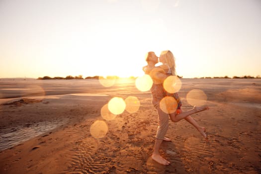 happy couple on the beach