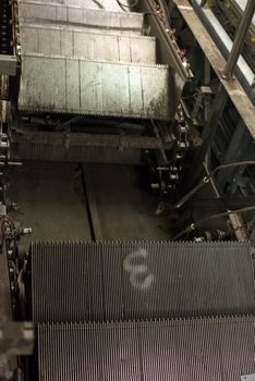 Installation of a new escalator during renovation works in a metropolitan railway station using heavy machinery