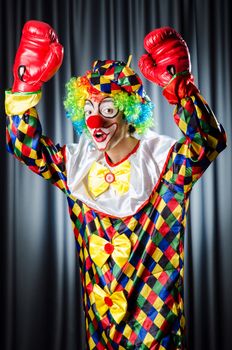 Funny clown in the studio shooting