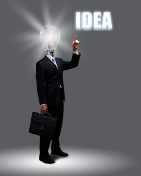 Light bulb and a business person as symbols of creativity in business