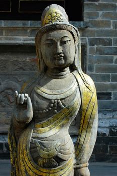 Ancient stone sculpture art of a Buddha