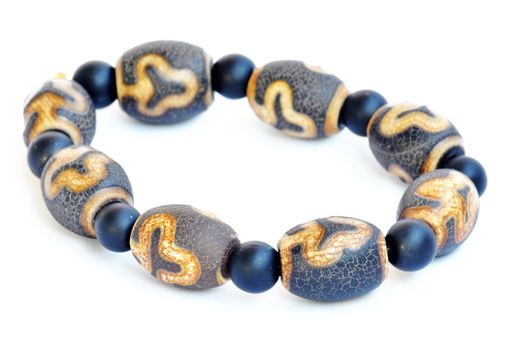 Wooden prayer beads on a white background