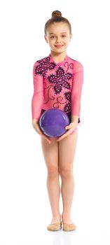 Little gymnast with ball on a white background. Sporting exercise, stretch, flexibility, aerobics