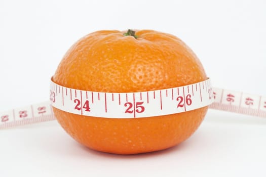 Orange and measuring tape