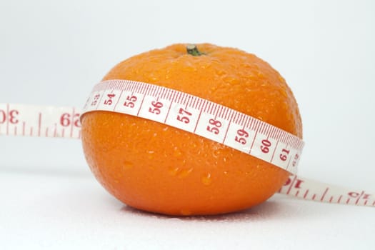 Orange and measuring tape