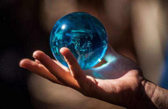 glass ball in hand