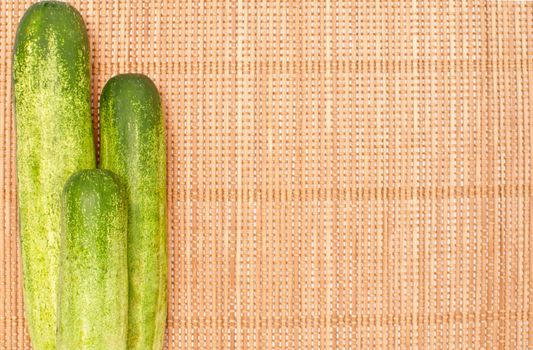 abstract design background vegetables on a bamboo mat background