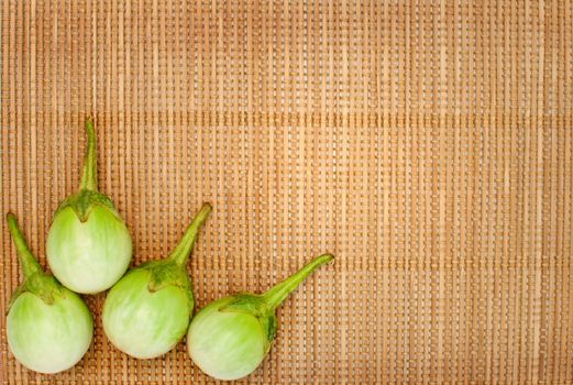 abstract design background vegetables on a bamboo mat background