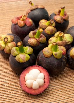 mangosteen on bamboo mat background