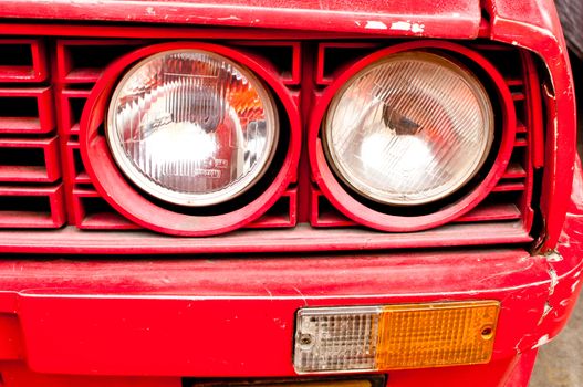 red retro car headlight