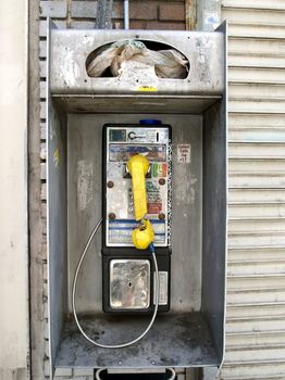 Dirty broken public phone