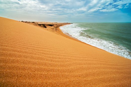 A view of the coastline as seen from the Taroa sand dune.