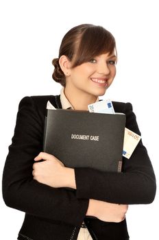 Business woman holding the document case with money in the hands as a symbol of wealth