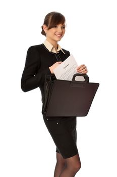 Businesswoman taking out from a suitcase contract for new employees