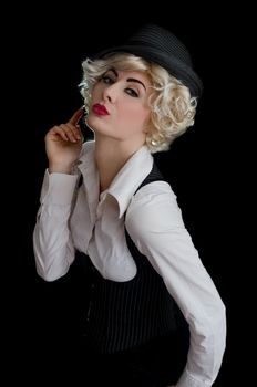 Retro-styled woman with hat over black