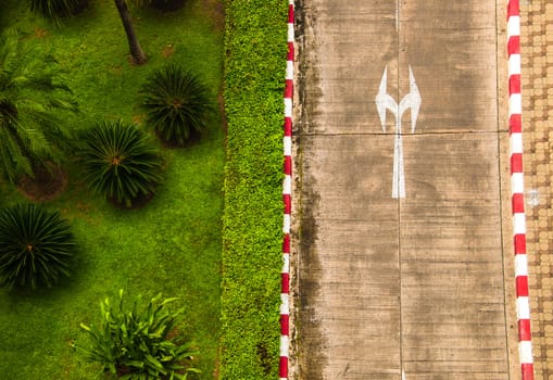 Top view shoot of concrete  street and garden