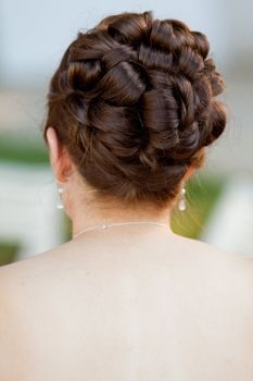 Detail of a bride's hairdo for her wedding.