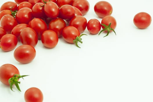 photo of very fresh tomatoes presented on white background