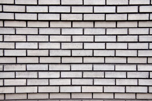 Grey bricks create a simple pattern perfect for a background image.