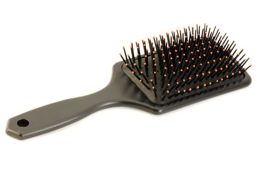 Plastic comb on a white background