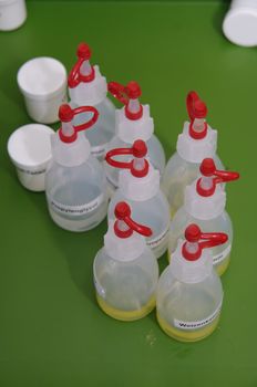 chemicals on a laboratory table no trademark visible