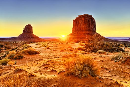 the Monument Valley Tribal Park At Sunrise, Arizona