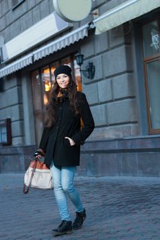 happy smiling fashion woman on the street