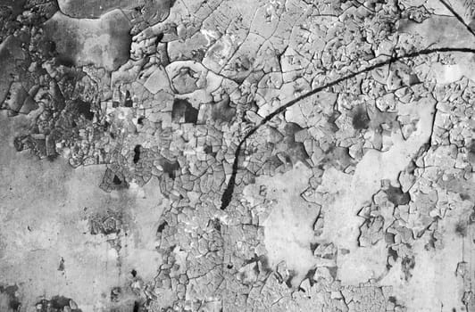 Stone wall in grunge style with many cracks