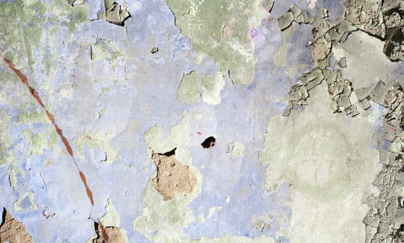Stone wall in grunge style with many cracks