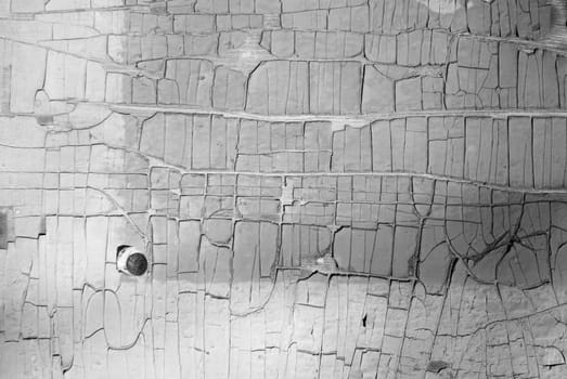 Stone wall in grunge style with many cracks