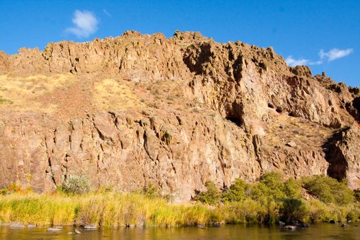 Water flows along the Owyhee River in Eastern Oregon.