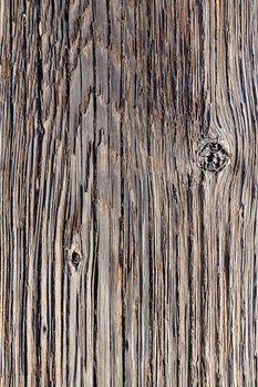 Wood boards are photographed at a dock to create some individual abstract images of the texture of wood after being weathered for many years.