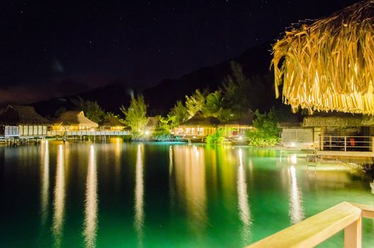 Overwater Bungalows at night, French Polynesia