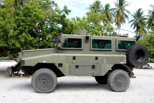 Heavy armored military vehicles parked in the camp