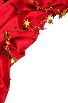 Smooth Red Silk with golden stars as holiday background 