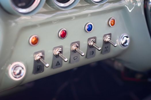 Close up of push buttons in an old classic car