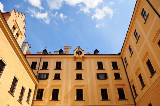 Courtyard of Konopiste Castle over blue sky