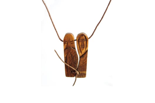 Ethnic wooden amulet isolated on white