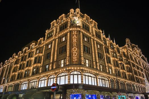 LONDON, UK - NOVEMBER 05: Corner of famous department store Harrods. Its Christmas lights have become a London tradition. November 05, 2012 in London.